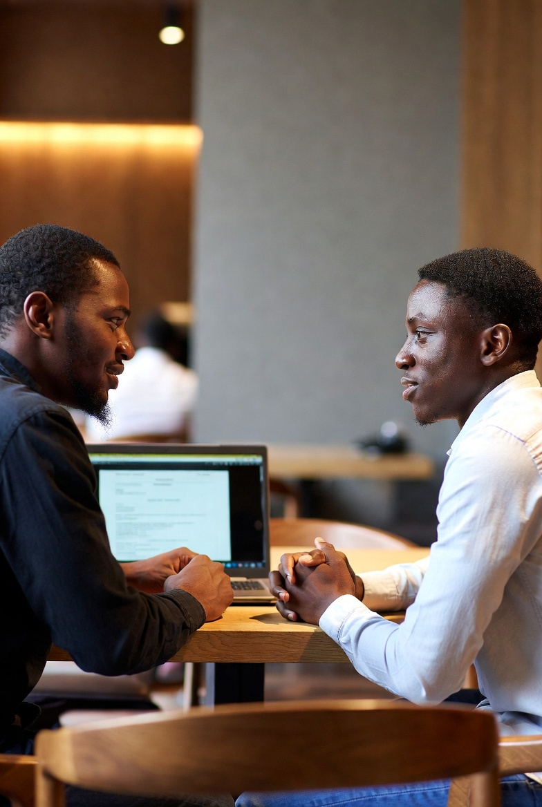 Mentor and graduate in a one-on-one guidance session